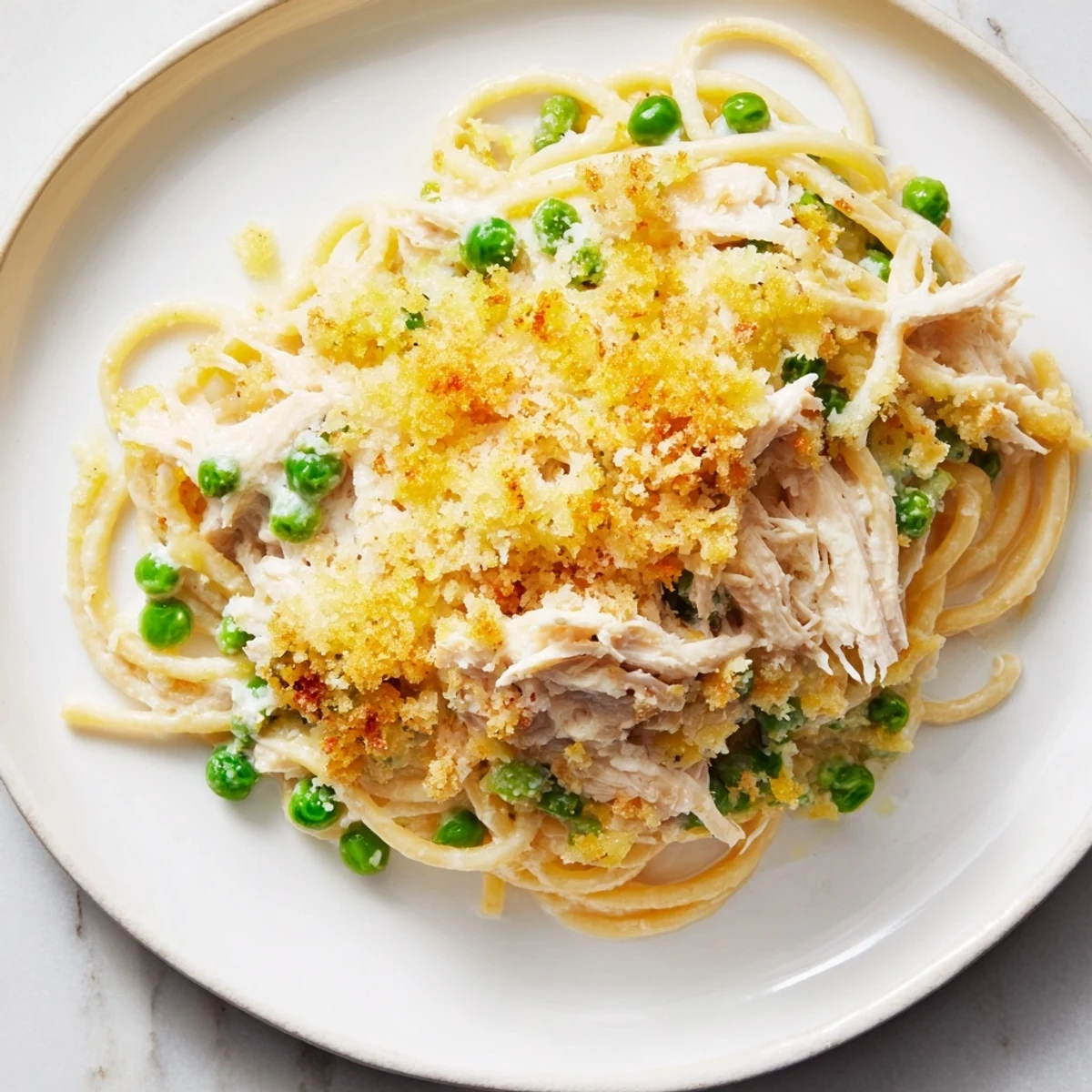 Golden-brown, bubbly Turkey/Chicken Tetrazzini Bake, a comforting family meal ready in 20 minutes.