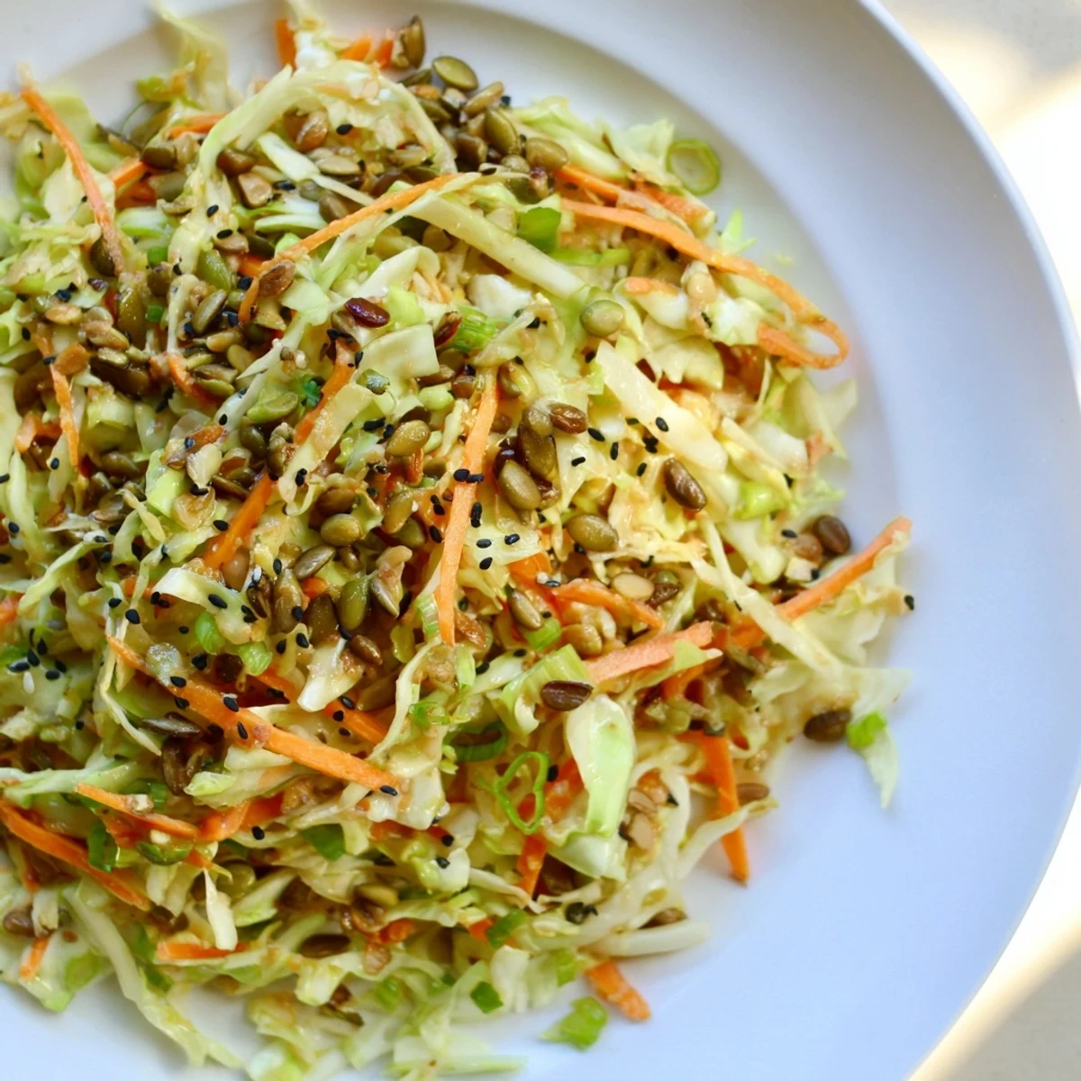 Close-up of a vibrant Cabbage Core Slaw salad; a healthy, gluten-free lunch option, bursting with flavor.