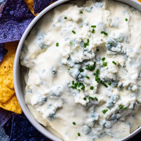 Frozen Pond Blue Dip Platter, a stunning blue cheese dip, encircled by fresh vegetables and crunchy chips.