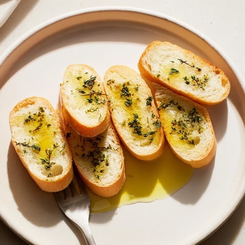 Golden brown, crispy baguette slices arranged in a delicious circle, ready for serving.