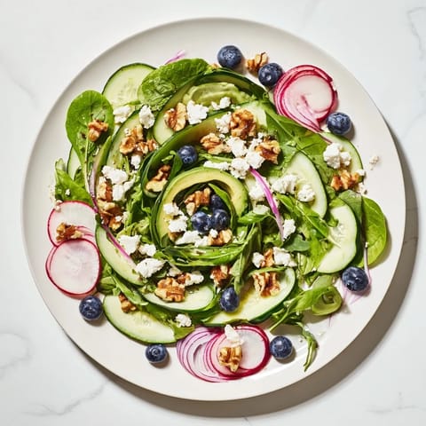 A colorful photo of the Fibonacci Fan Salad, perfectly arranged, showing off the spiral design.