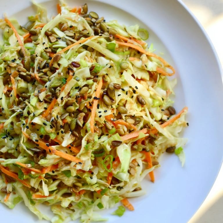 Close-up of a vibrant Cabbage Core Slaw salad; a healthy, gluten-free lunch option, bursting with flavor.